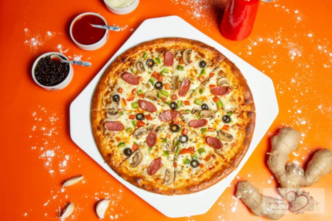 بيتزا الفصول الأربعة حجم عائلي